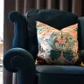 Armchair recovered with contrasting back and modified arm