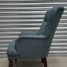 Buttoned back chair recovered