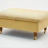 Footstool with castors