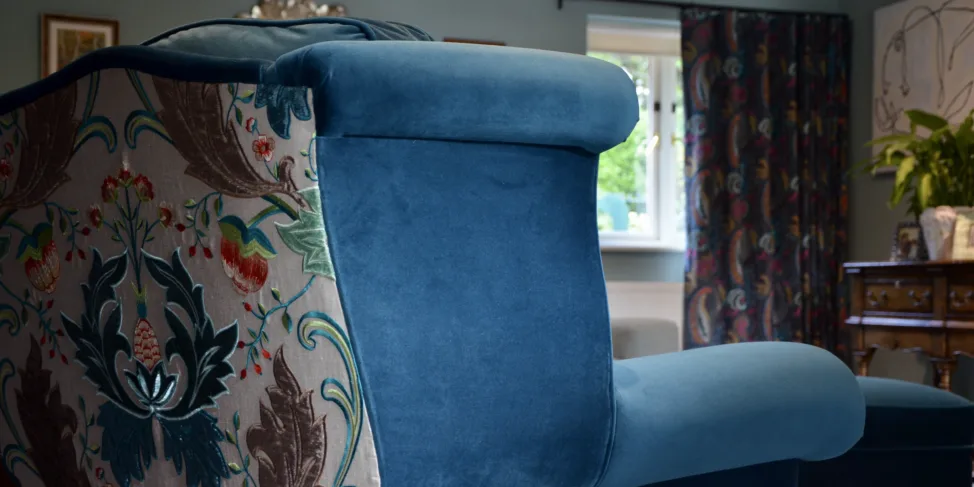 Armchair recovered with contrasting back and modified arm