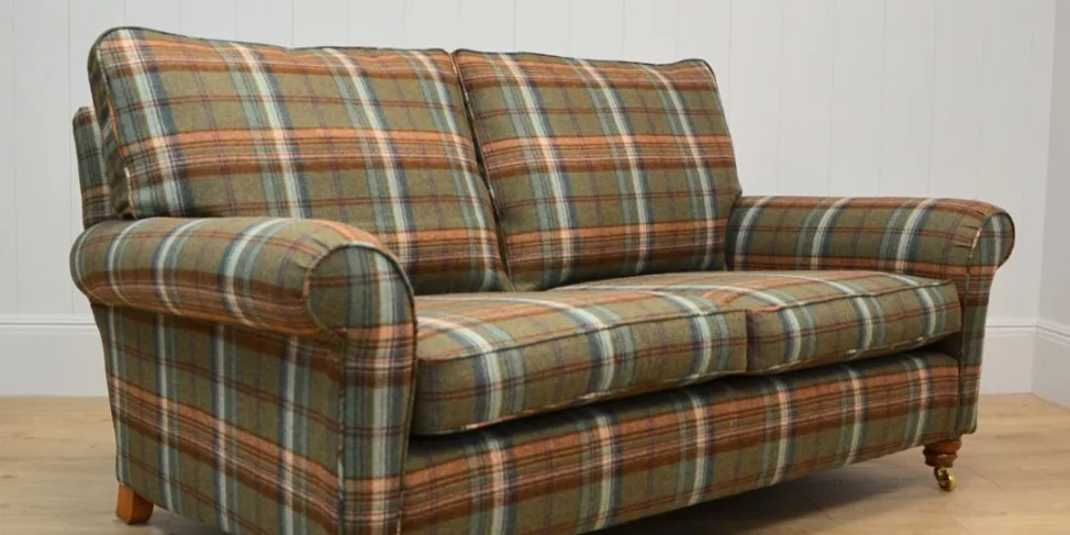 Sofa recovered in a tartan wool
