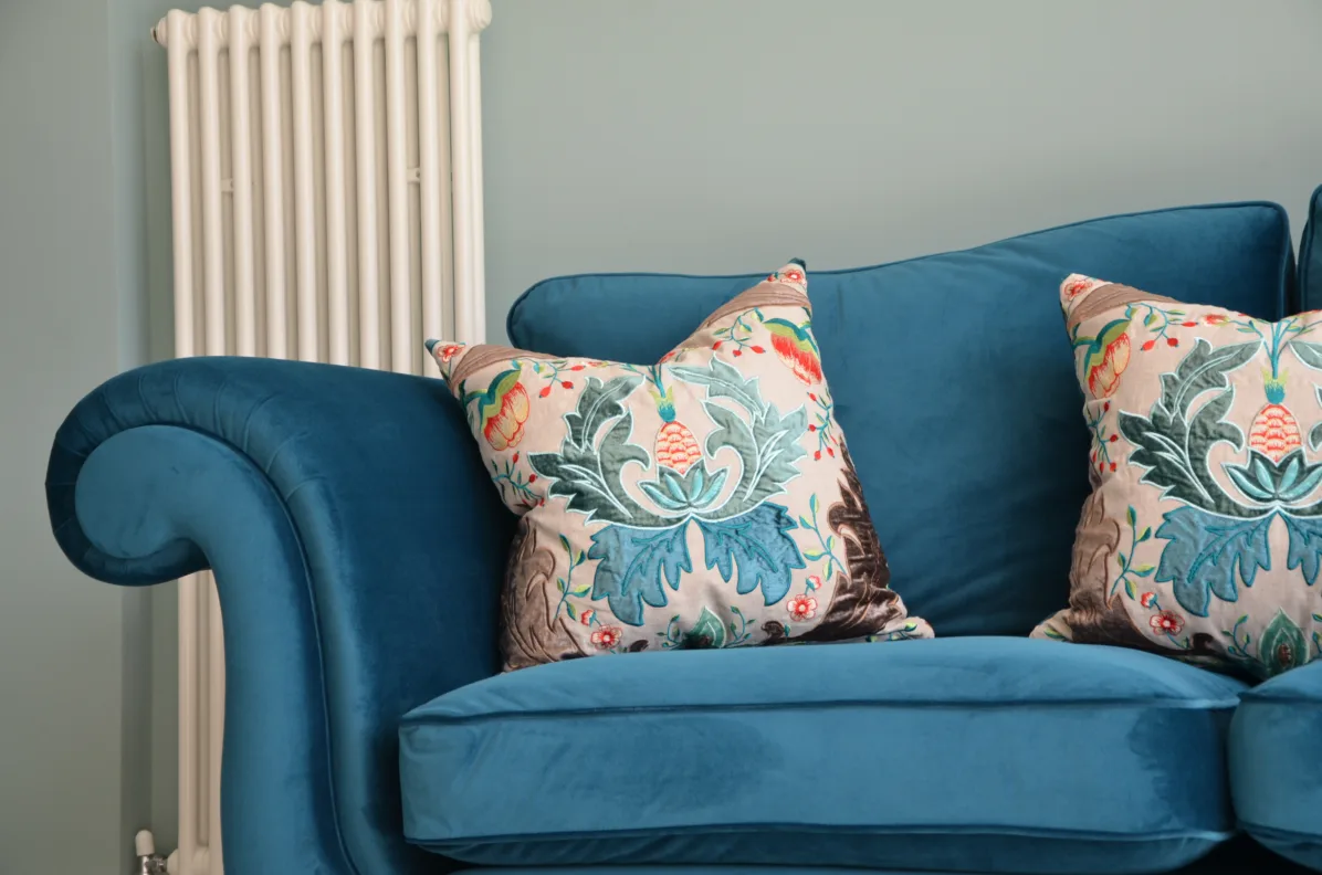 Sofa reupholstered & arms modified