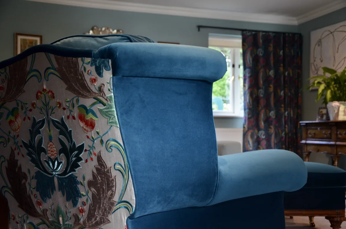Armchair recovered with contrasting back and modified arm