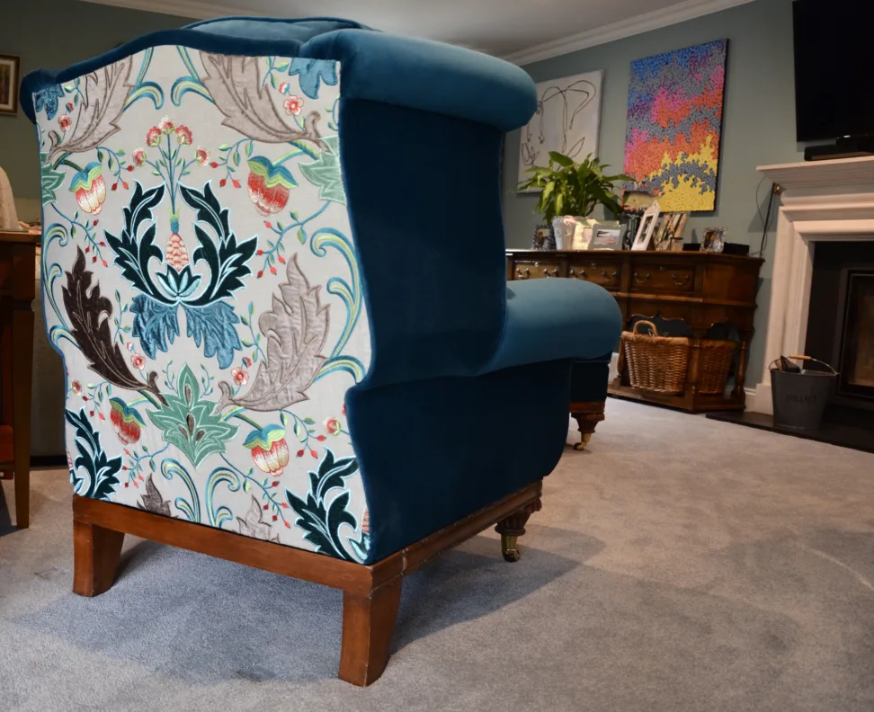 Armchair recovered with contrasting back and modified arm