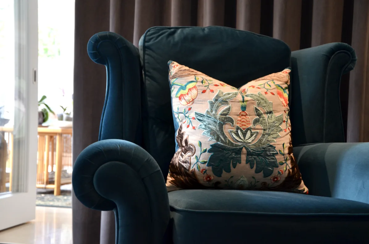 Armchair recovered with contrasting back and modified arm