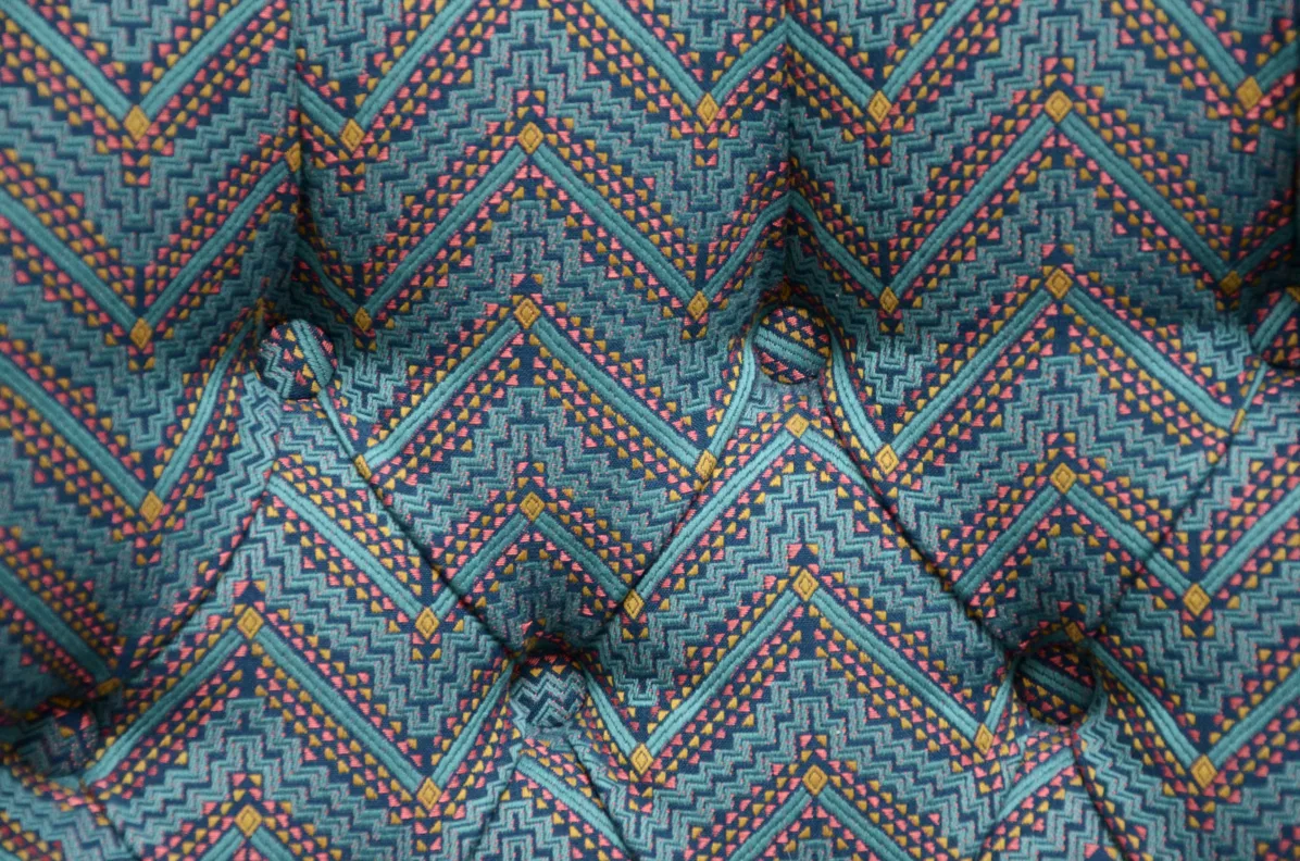 Buttoned back chair recovered