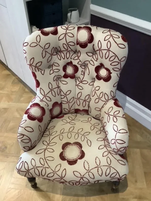 Buttoned back chair recovered