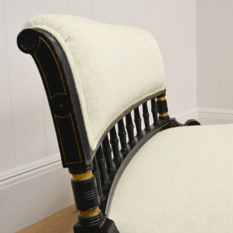 ANTIQUE WOODEN BENCH RE-COVERED IN A CREAM LINEN WITH DOUBLE PIPING