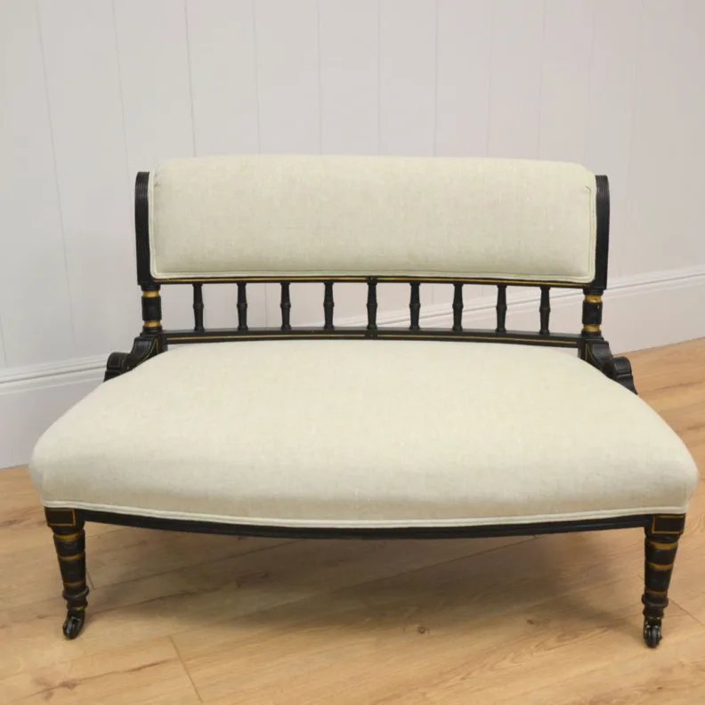 ANTIQUE WOODEN BENCH RE-COVERED IN A CREAM LINEN WITH DOUBLE PIPING