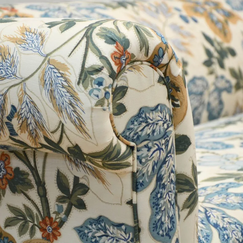 An elegant chesterfield recovered in a gorgeous printed linen