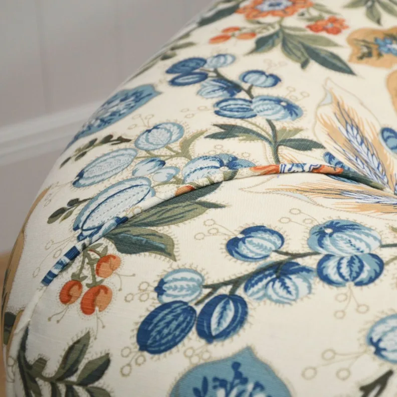 An elegant chesterfield recovered in a gorgeous printed linen