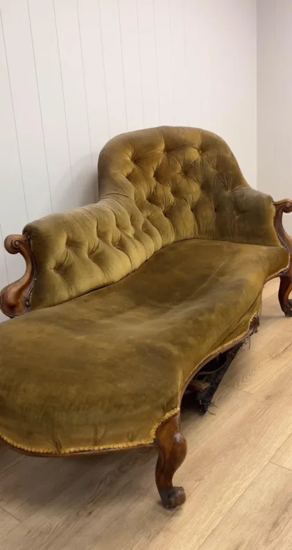 Chaise lounge reupholstered using traditional techniques and materials