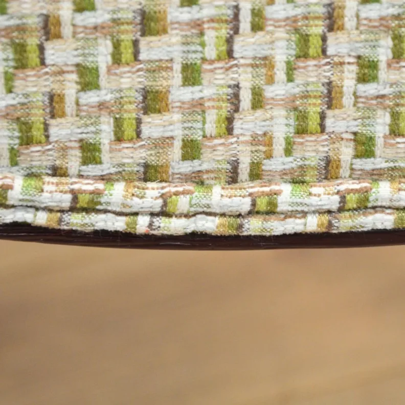 Wooden stool recovered in a woven fabric