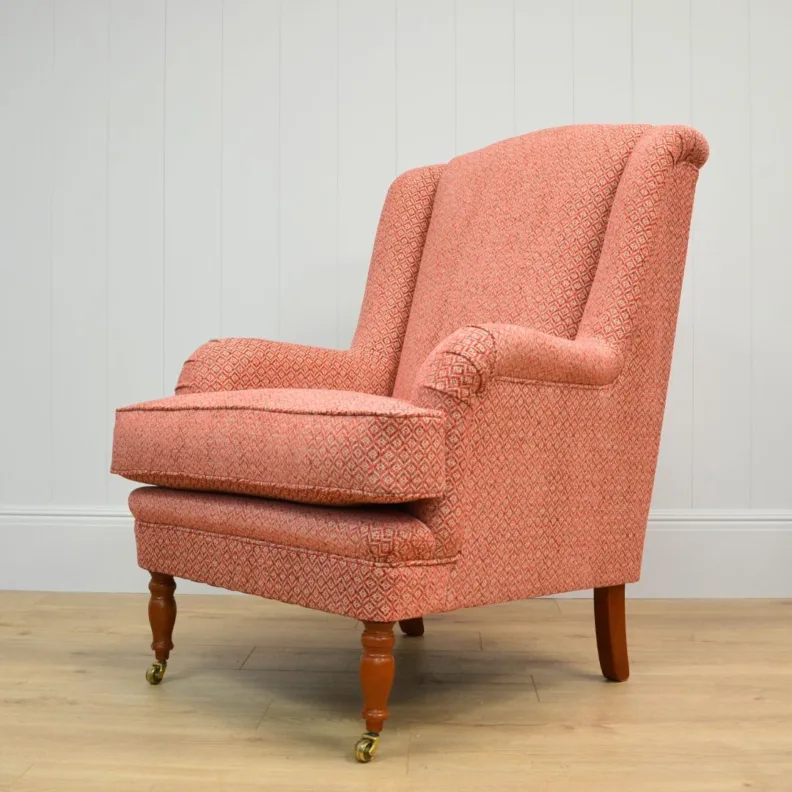 A high back Wesley Barrell chair, recovered in a small scale diamond chenille fabric