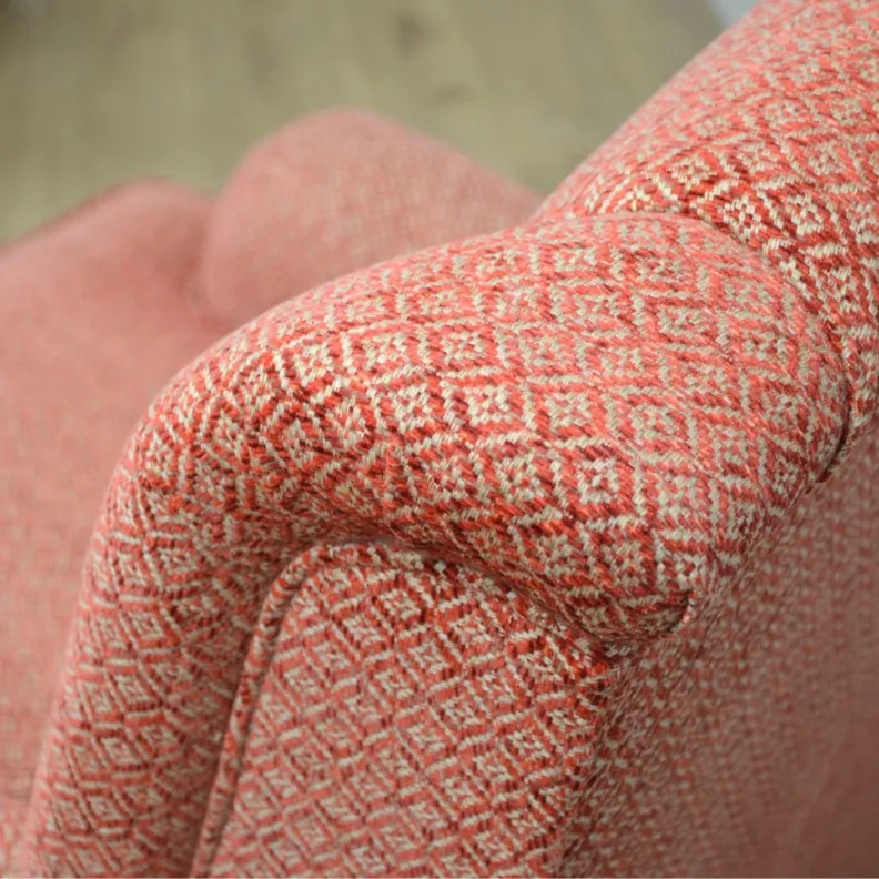 A high back Wesley Barrell chair, recovered in a small scale diamond chenille fabric