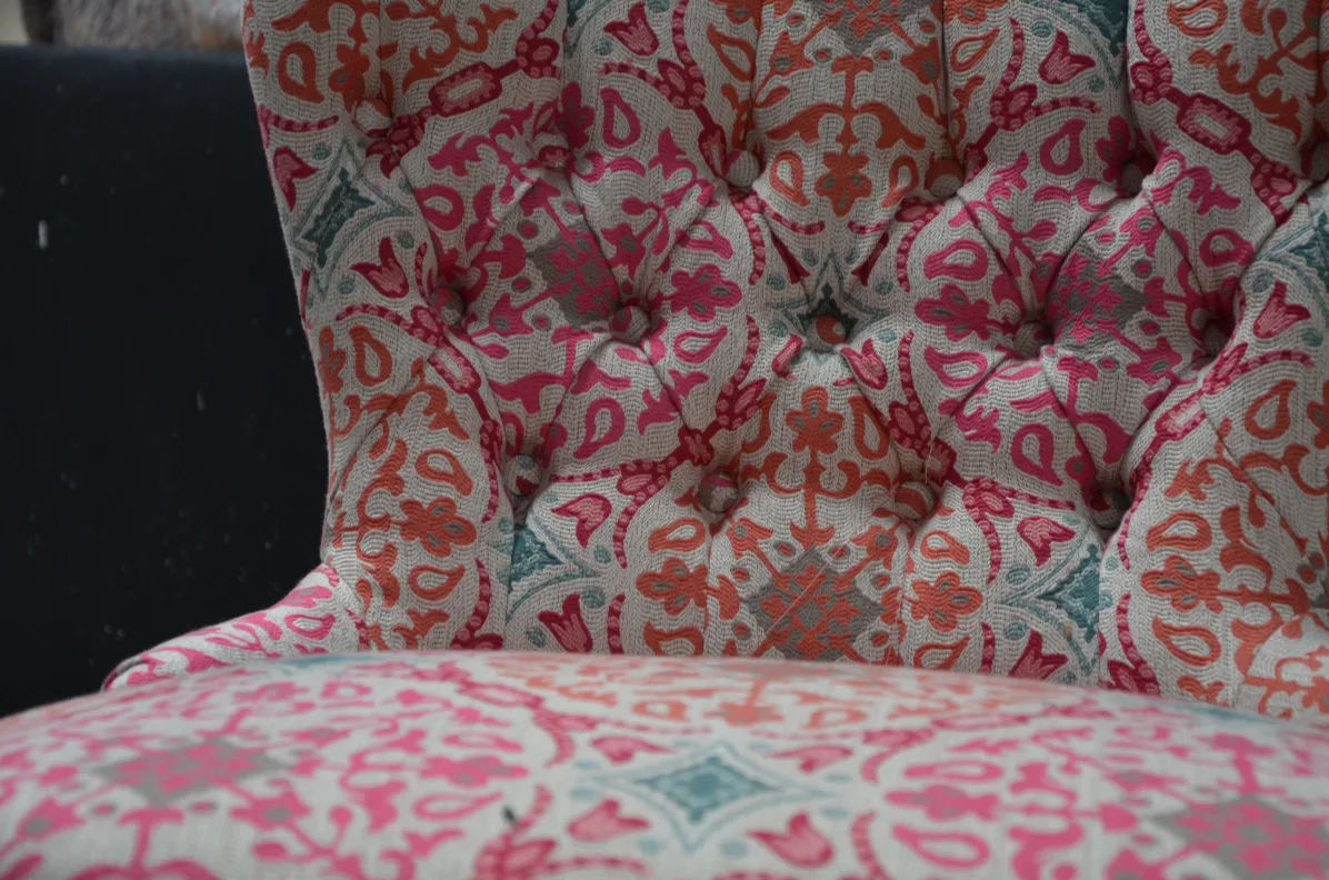 Buttoned back cocktail chair