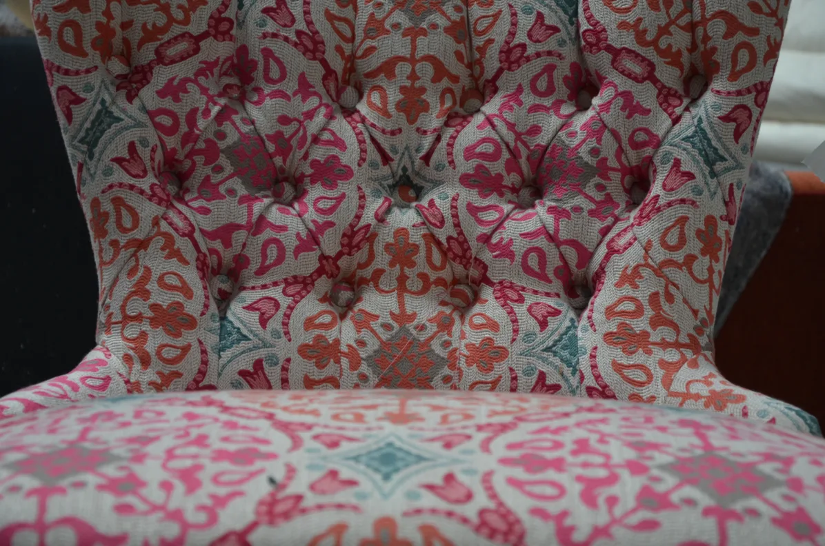 Buttoned back cocktail chair