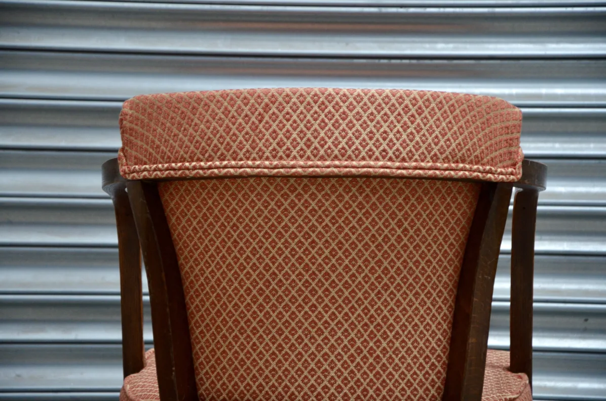 Curved Wooden Armed Chair